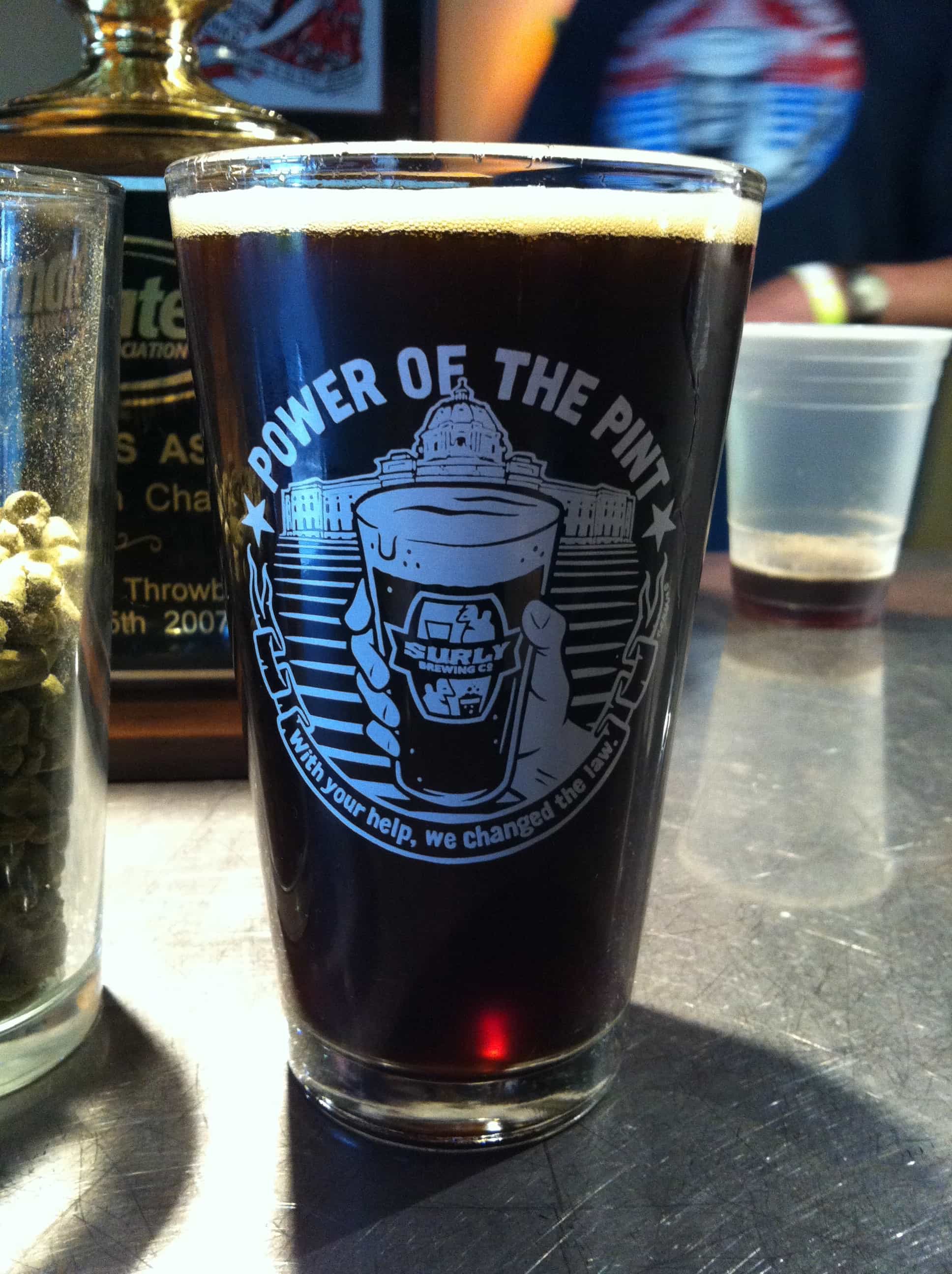 https://www.craftbeertime.com/wp-content/uploads/2011/08/SurlyPowerOfThePintMoesBender.jpg?a1f92f